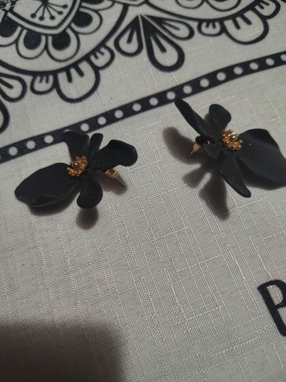 Black Floral Petal Stud Earrings with Gold Accent